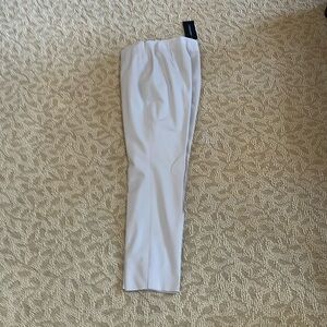 Beautiful woman’s cream slacks.